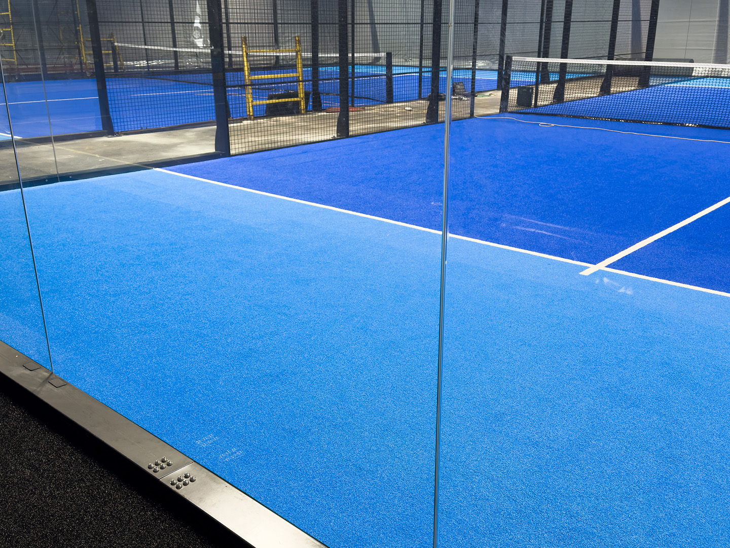 padel parois bruit